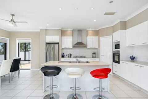 Central Gold Coast Large, Modern, Elevated Home - Sunshine Coast Guide 0