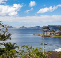 Iluka 46 Soldiers Point Rd Stunning Air Conditioned house with WIFI  Water Views - Sunshine Coast Guide