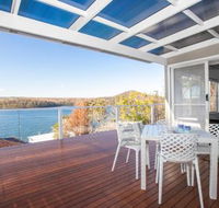Home on the Water 21 Evans St. Lake Conjola - Sunshine Coast Guide