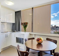 Cosmopolitan apartment at College St - Sunshine Coast Guide