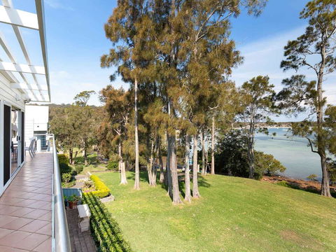 Unit 1 44 Danalene Pde Fantastic Waterfront Property With Air Con - Sunshine Coast Guide 0