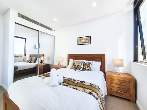 Relaxing 1BR W Pools & SPA, Gym In Olympic Park - Sunshine Coast Guide 0